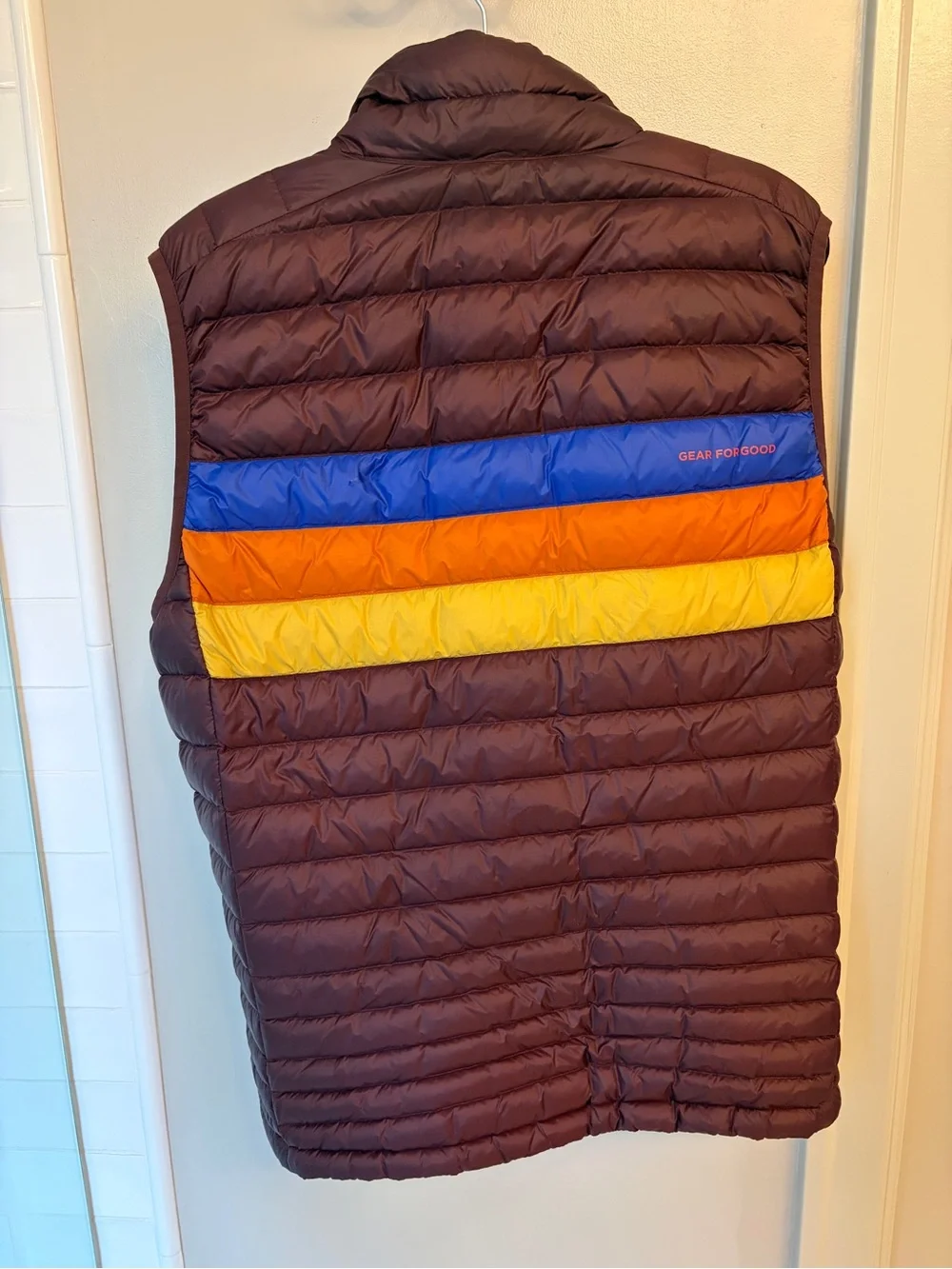 cotopaxi Navy Jacket Liner with Yellow Logo